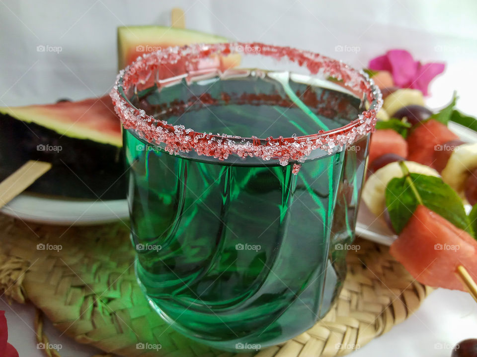 a very fresh mint's juice presented with various fruits