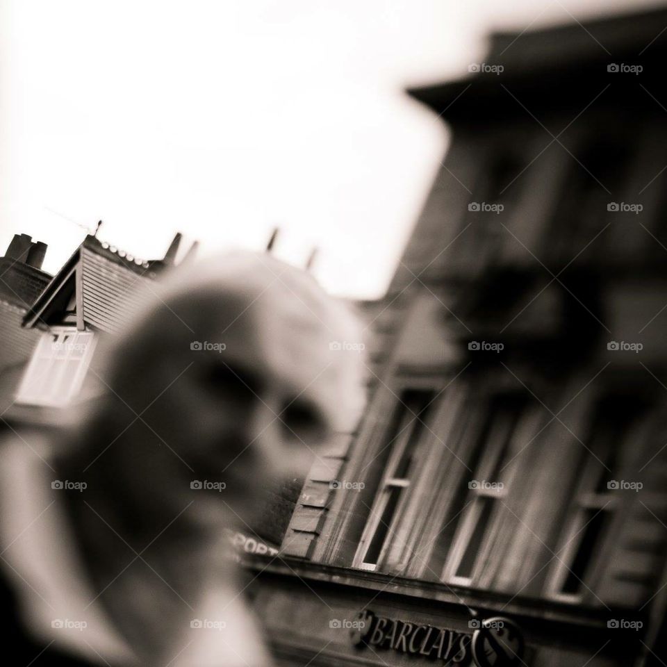 Blurred face in street