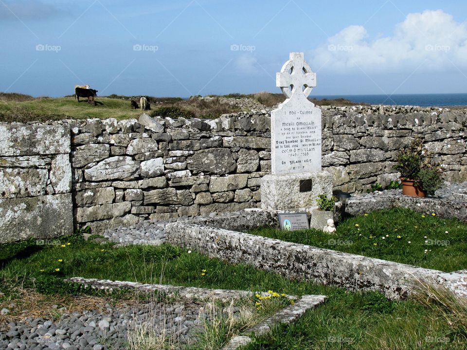 Ancient Wall. Ancient Wall & modern day grave