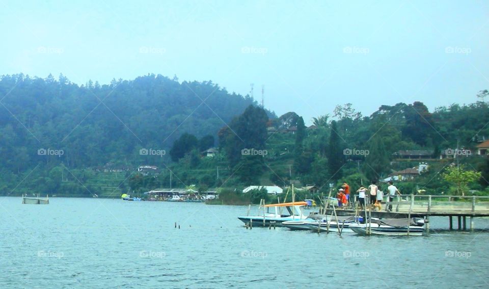 Lake Beratan at Bedugul is one of the most famous tourist attractions on Bali island which you can enjoy with boat also..