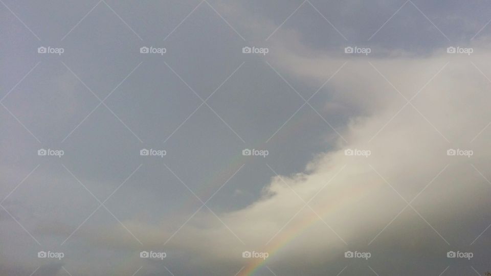 rainbow on the blue sky