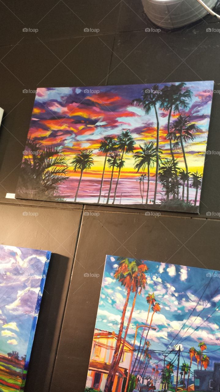beach paintings at art show