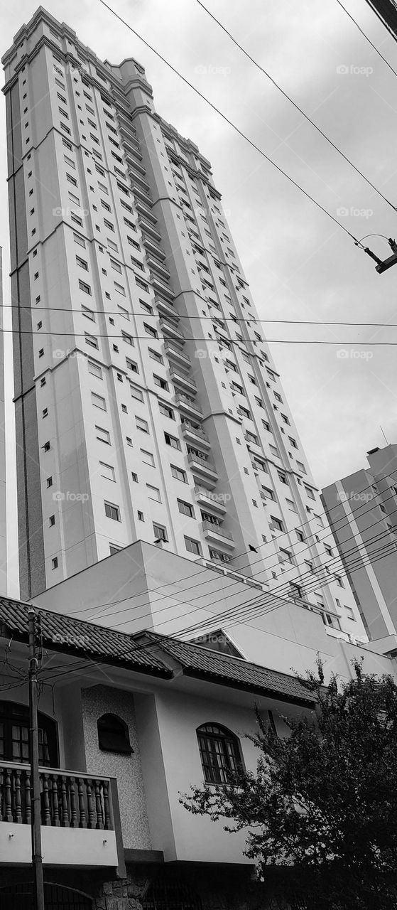 The grandeur of the large buildings, alongside some townhouses