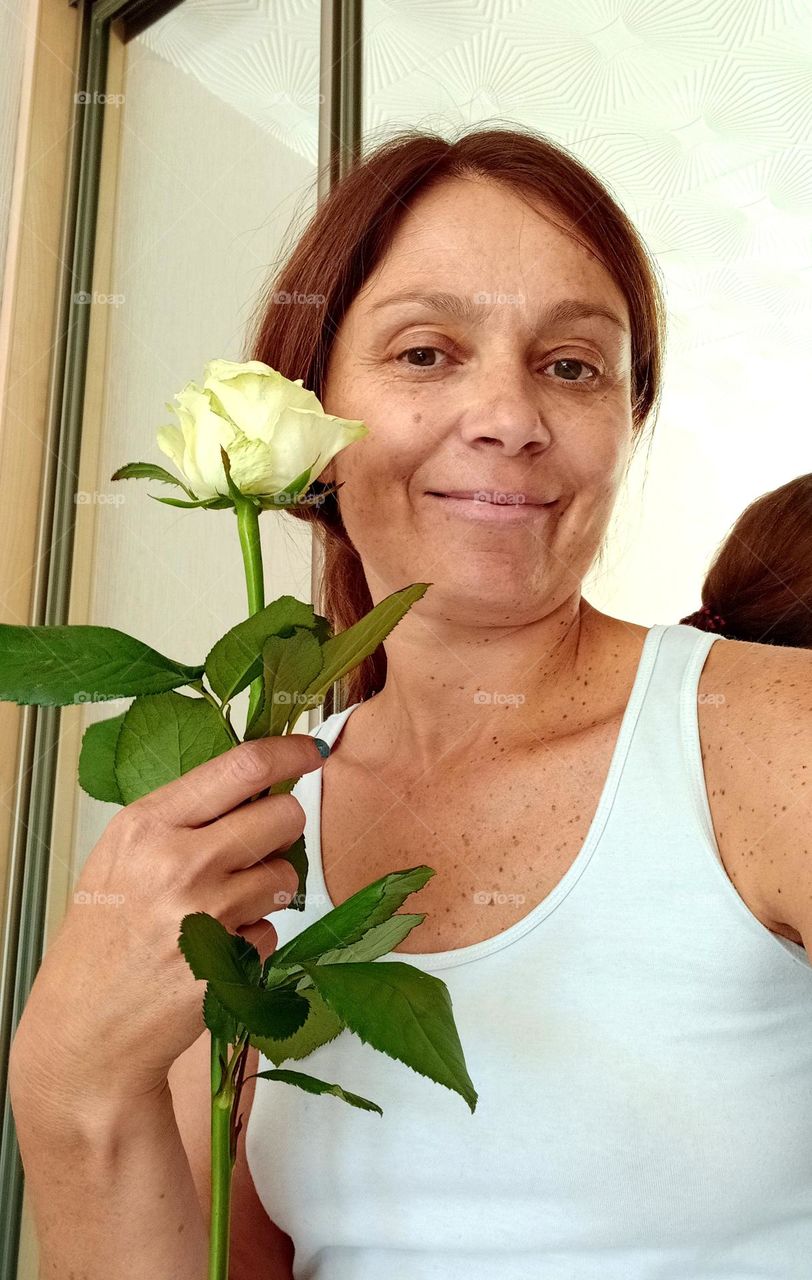 woman beautiful portrait with rose flower