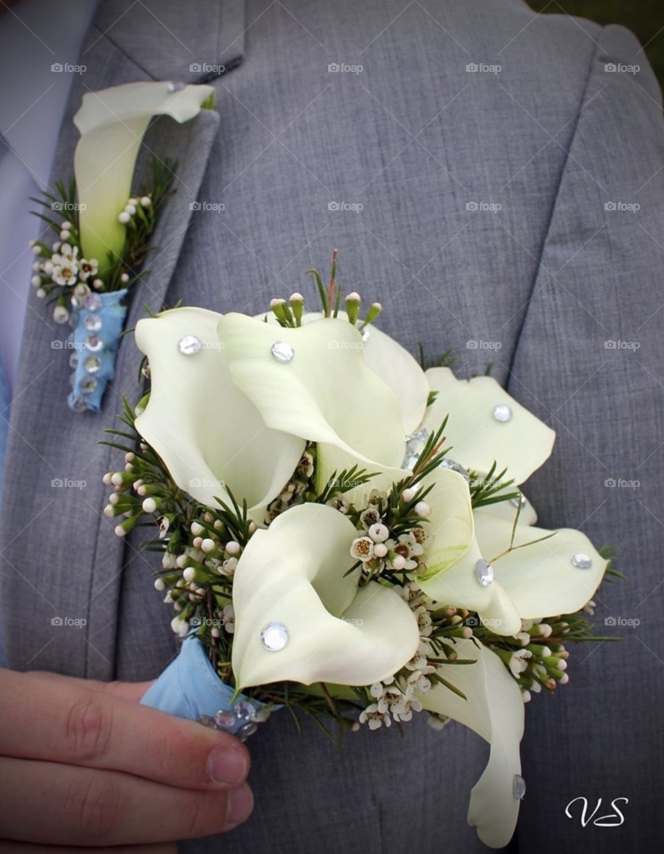 Beautiful fresh peace lily bouquet and boutonniere