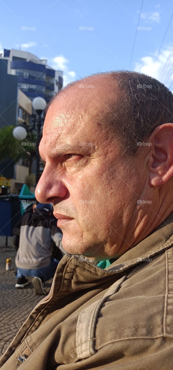 man in profile in the evening light