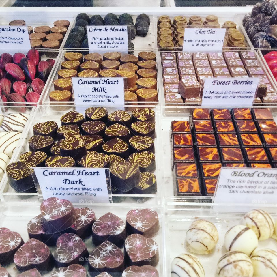 A delicious display of assorted chocolate.