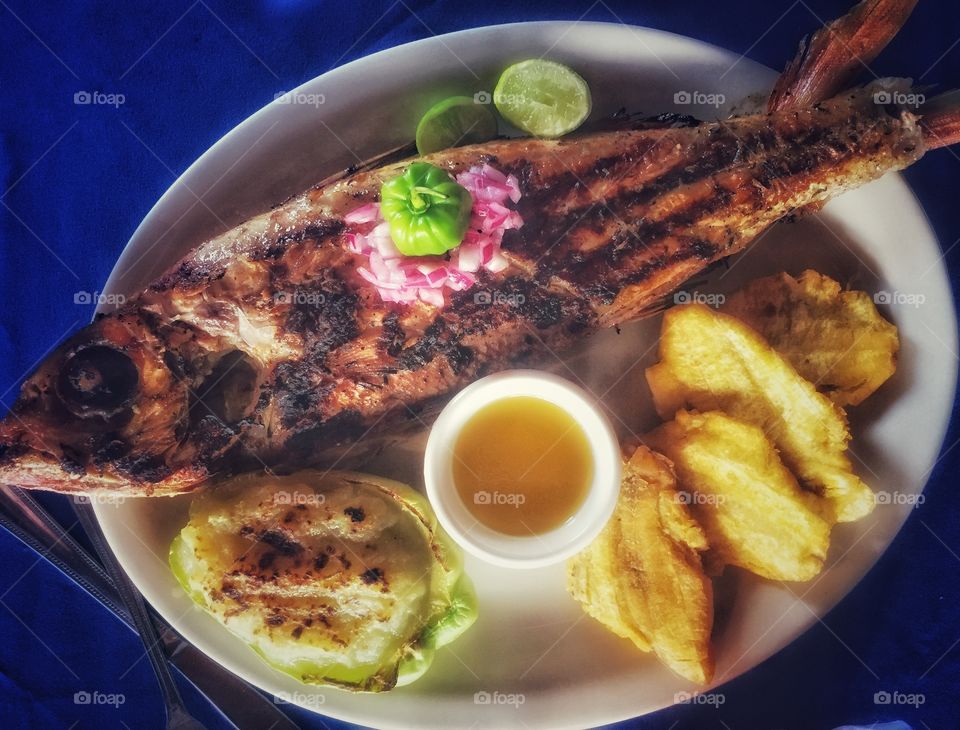 Grilled fish dinner Caribbean style