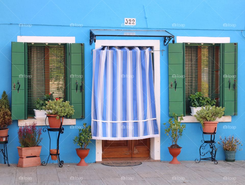 colored house with symmetrical windows