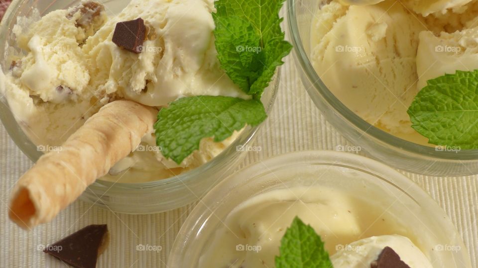 Chocolate chip and ice cream in glass bowls