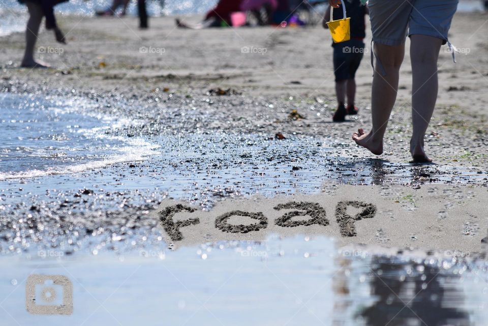 Foap spelled out in the sand