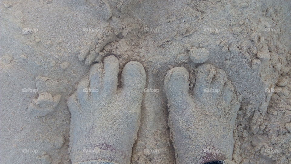 Foot in the sand