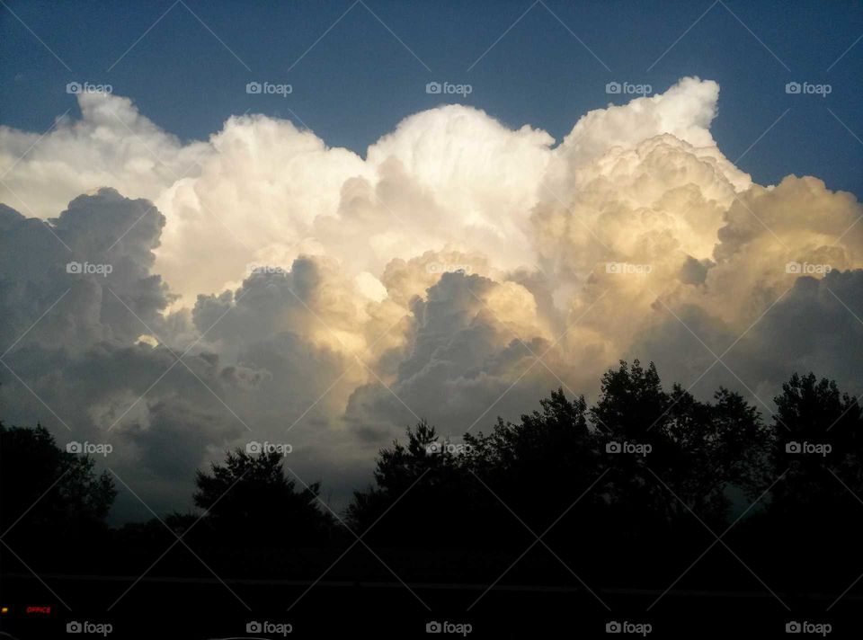 A calm, fluffy thunderhead after a storm near Lake Michigan