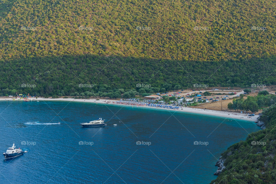 Boats moored at antisamos beach