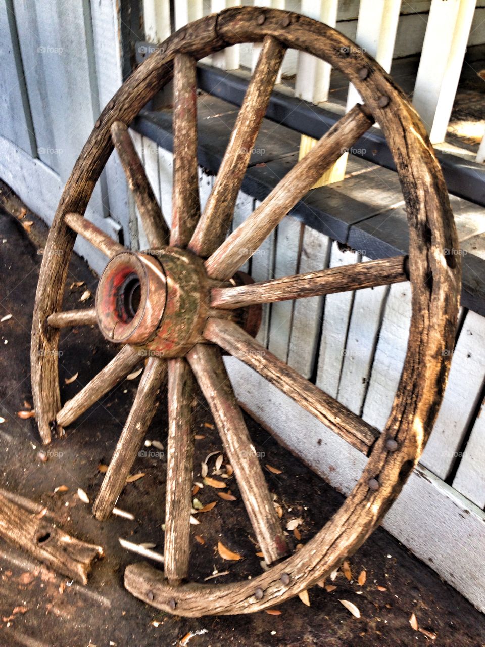 The old days. Old wagon wheel