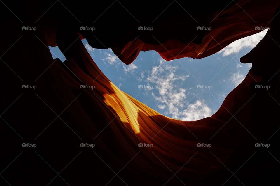 a reverse shilouette of the wall of a cave