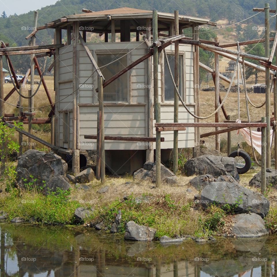 An unused monkey playhouse and structure reflecting in a field at the Wildlife Safari in Winston in Southern Oregon. 