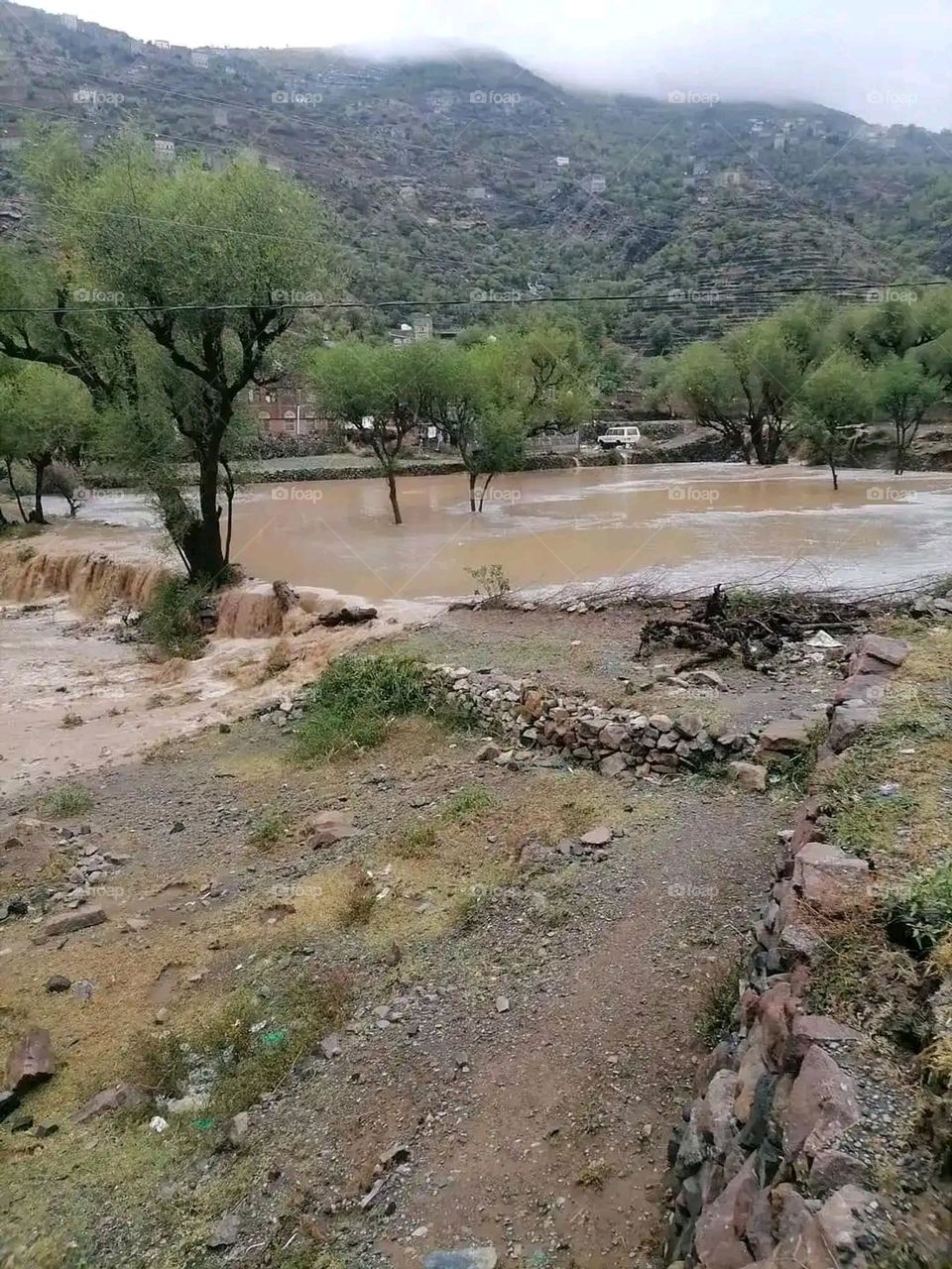 Glory be to God, the magnificent and picturesque view and the natural green trees are a view that is nothing more wonderful than it