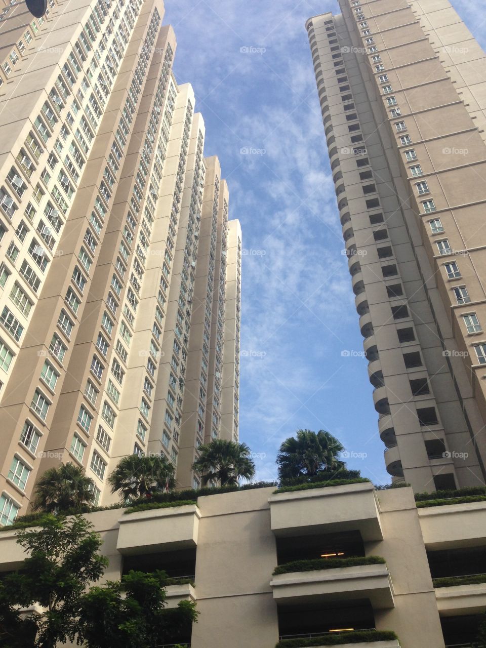 Touch the sky. Condo with blue sky