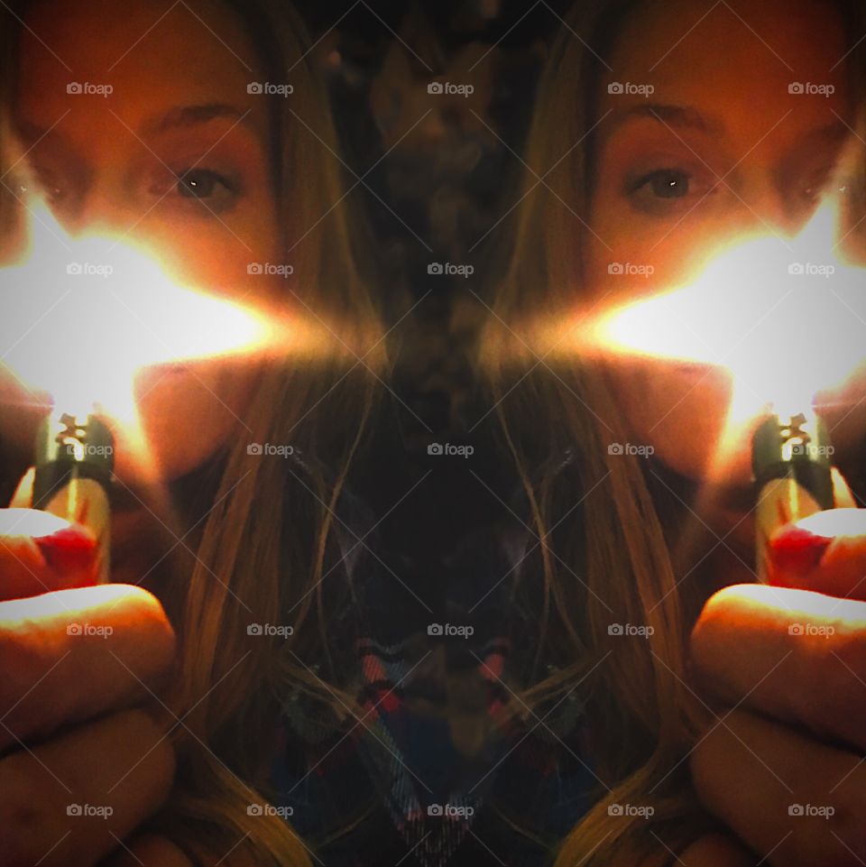 Mirrored flame image with girls face