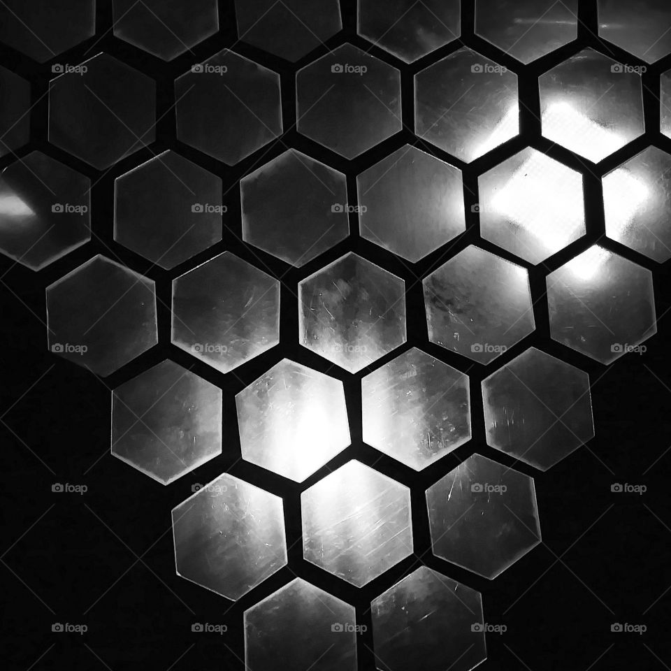 geometric design, Honey Bee Comb Designed mirrored triangle. black and white and silver.