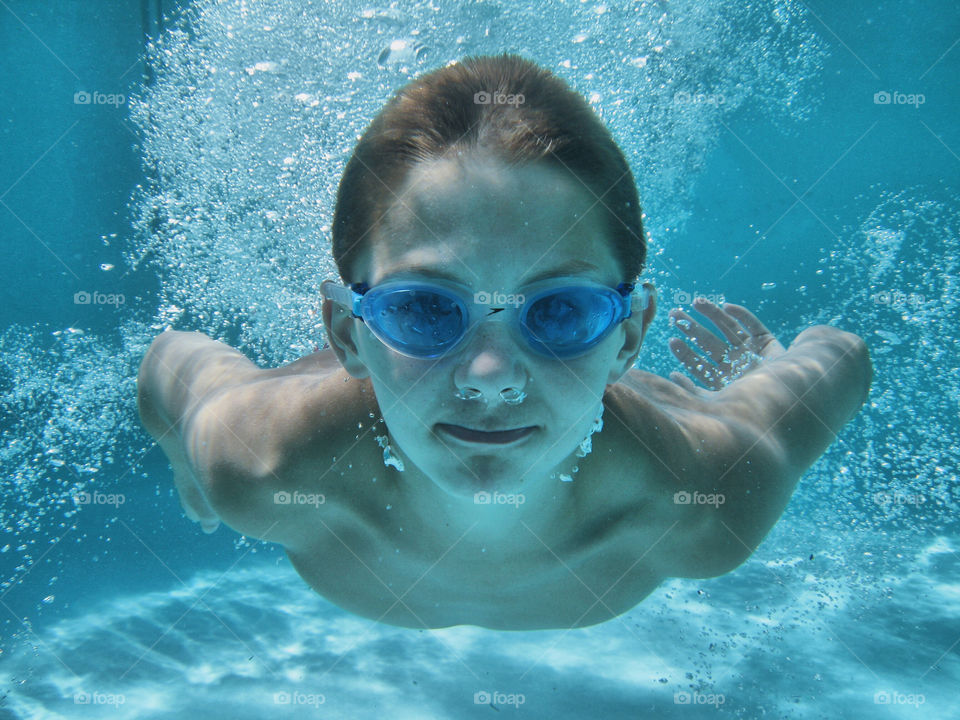 Woman swimming in pool