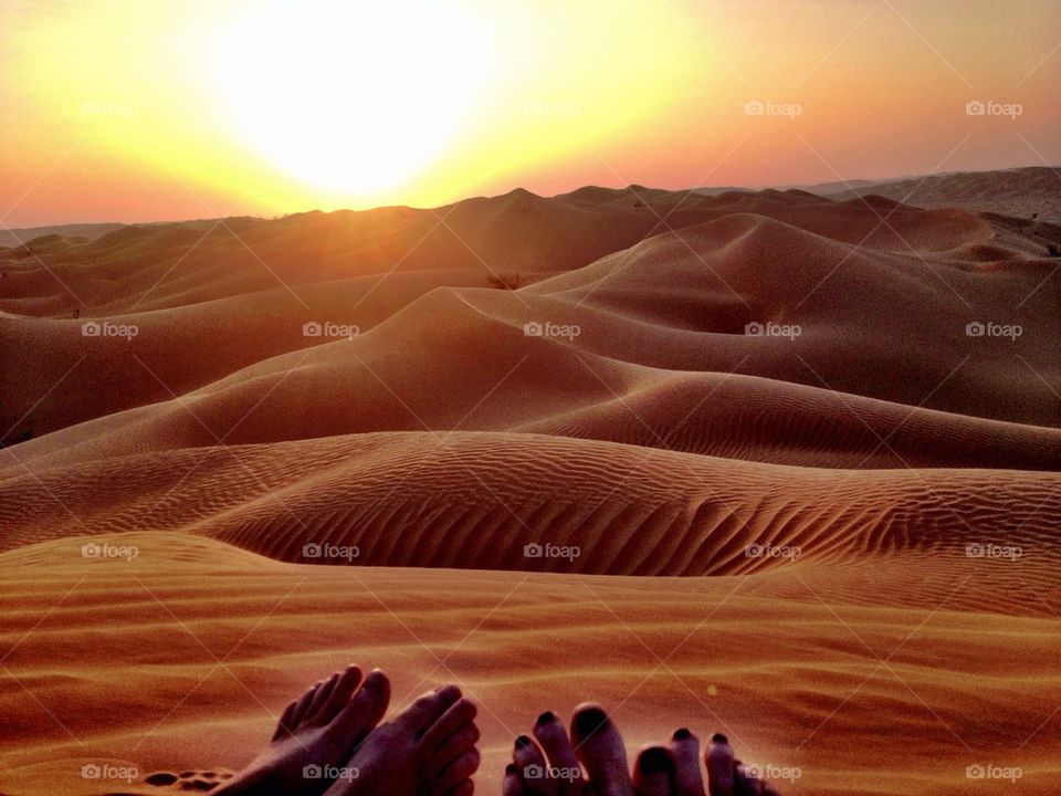 Feet in the sand dunes