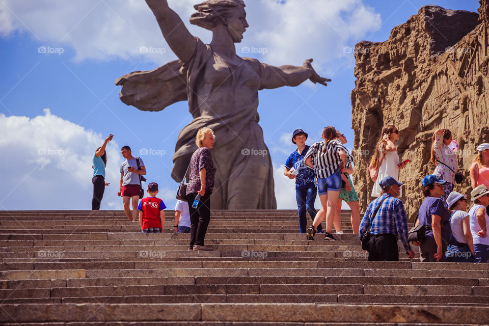 Tourists visit the most famous Statue in Volgograd city.