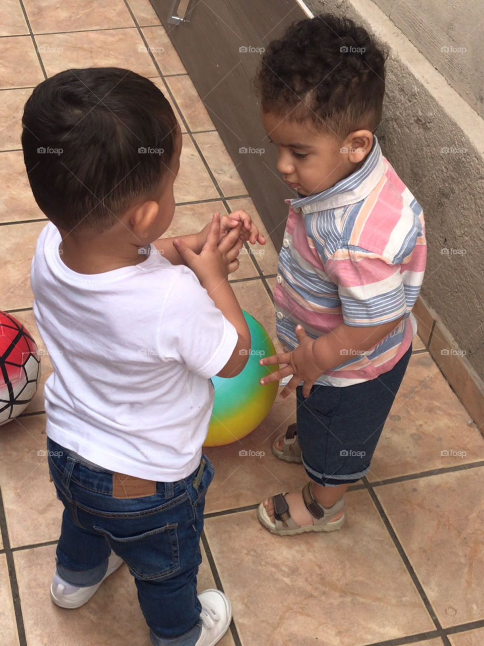 Babies playing football in brazil 