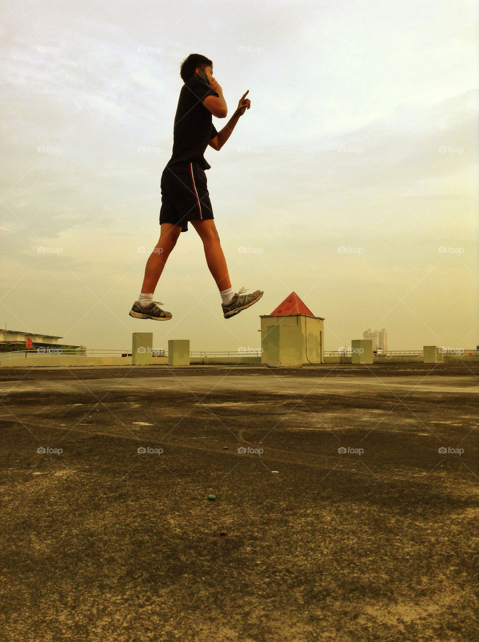 Talking on the telephone midair