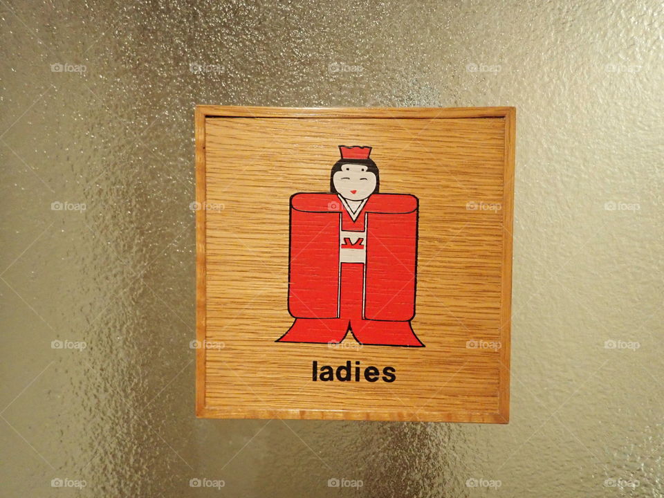 Ladies bathroom sign