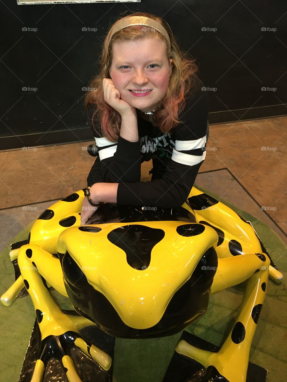 Lil poser with a poison dart frog at the Aquarium in SLC