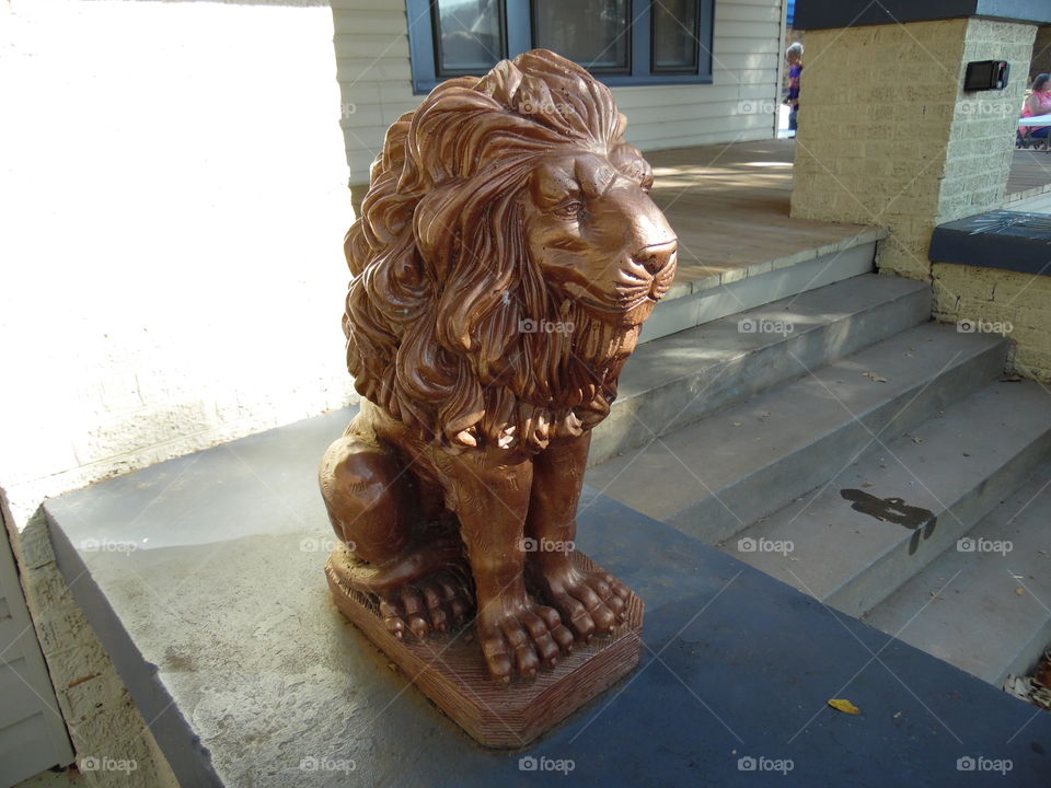 Leo ♌. This is a picture of a porch statue.
