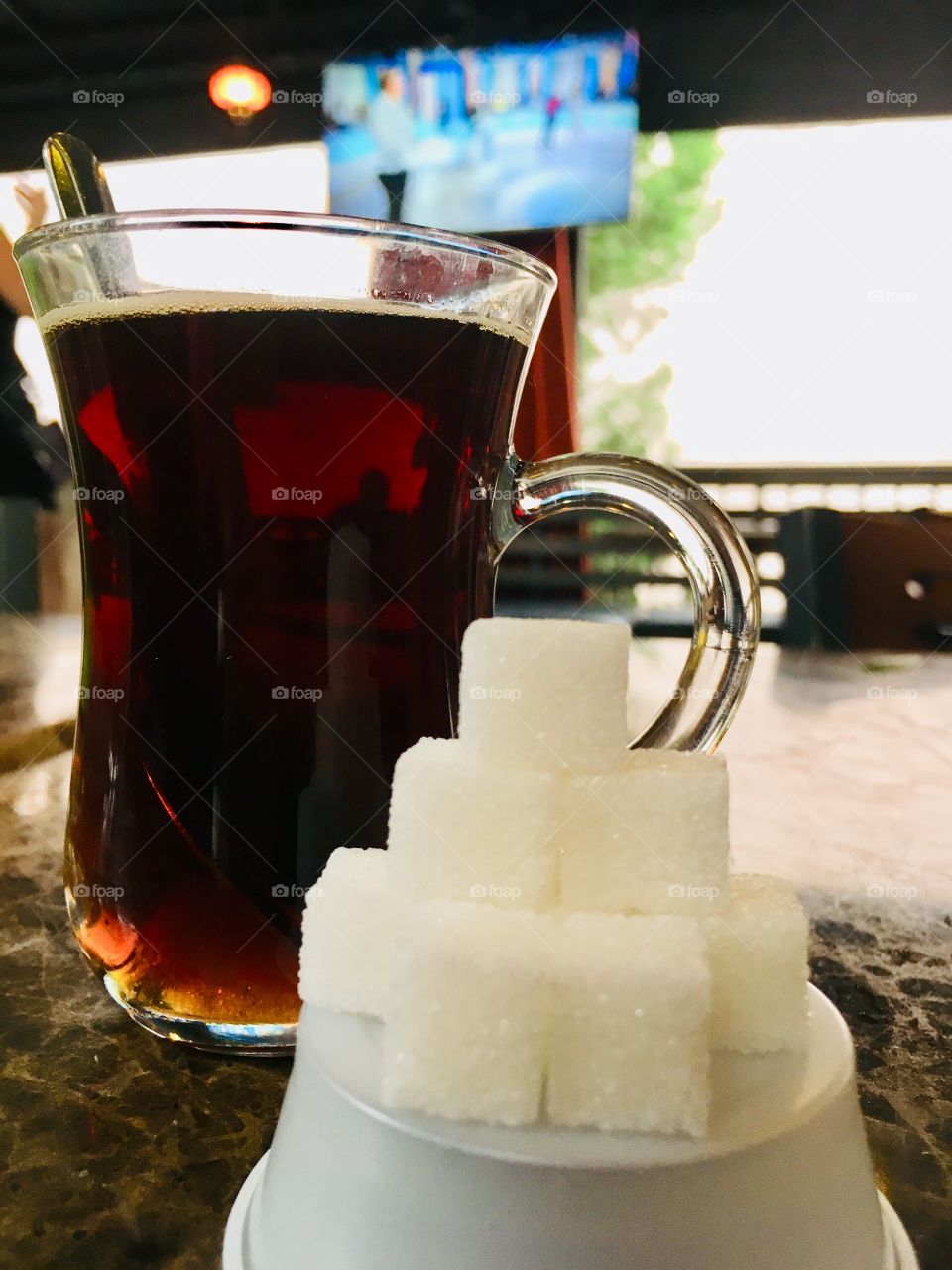 Pyramid of sugar cubes and Turkish tea