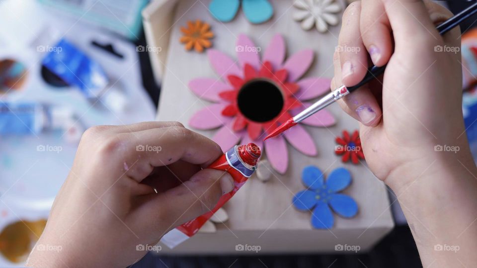 Painting a wooden bird house