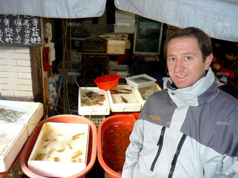 fish sales in shangai. comercial street in china