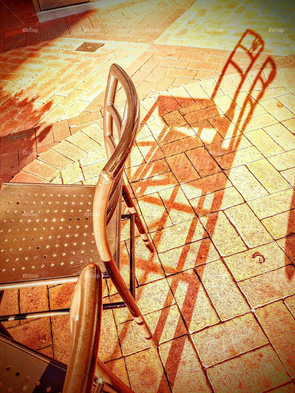 Elongated Shadows of chairs !