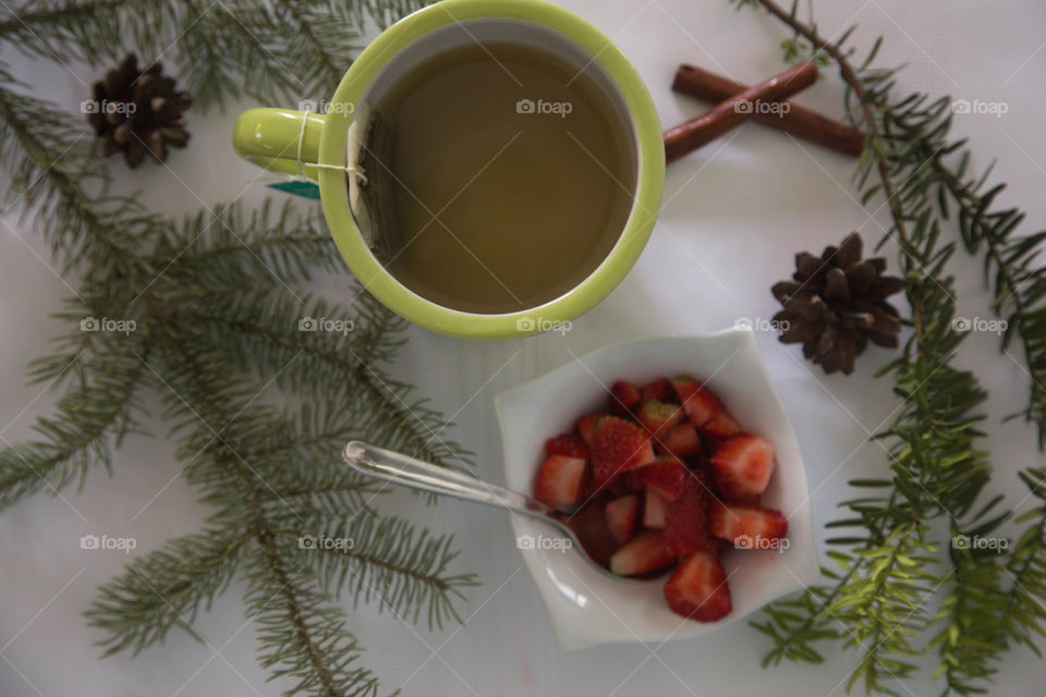 Tea, strawberries and pecan pie in a festive flat lay