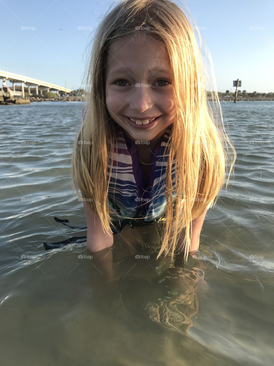 Little girl in the ocean