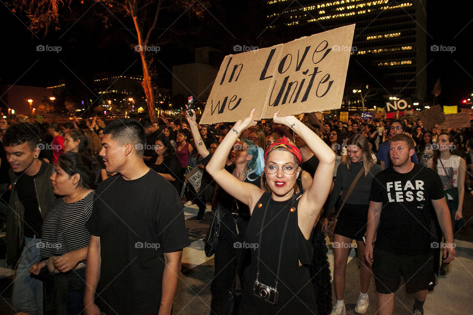 Crowd of protesters walking the streets of Los Angeles