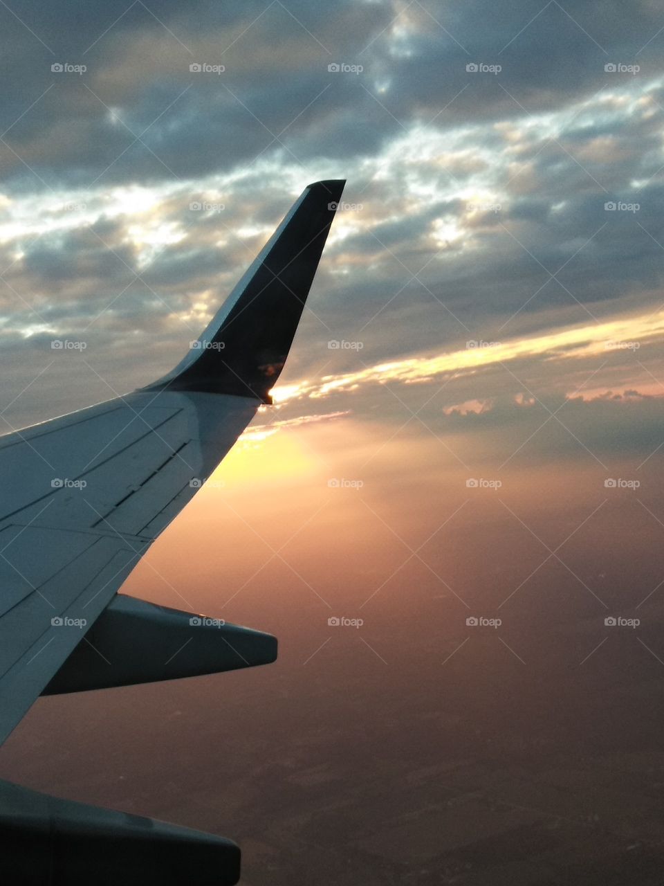 Sunset from inside airplane