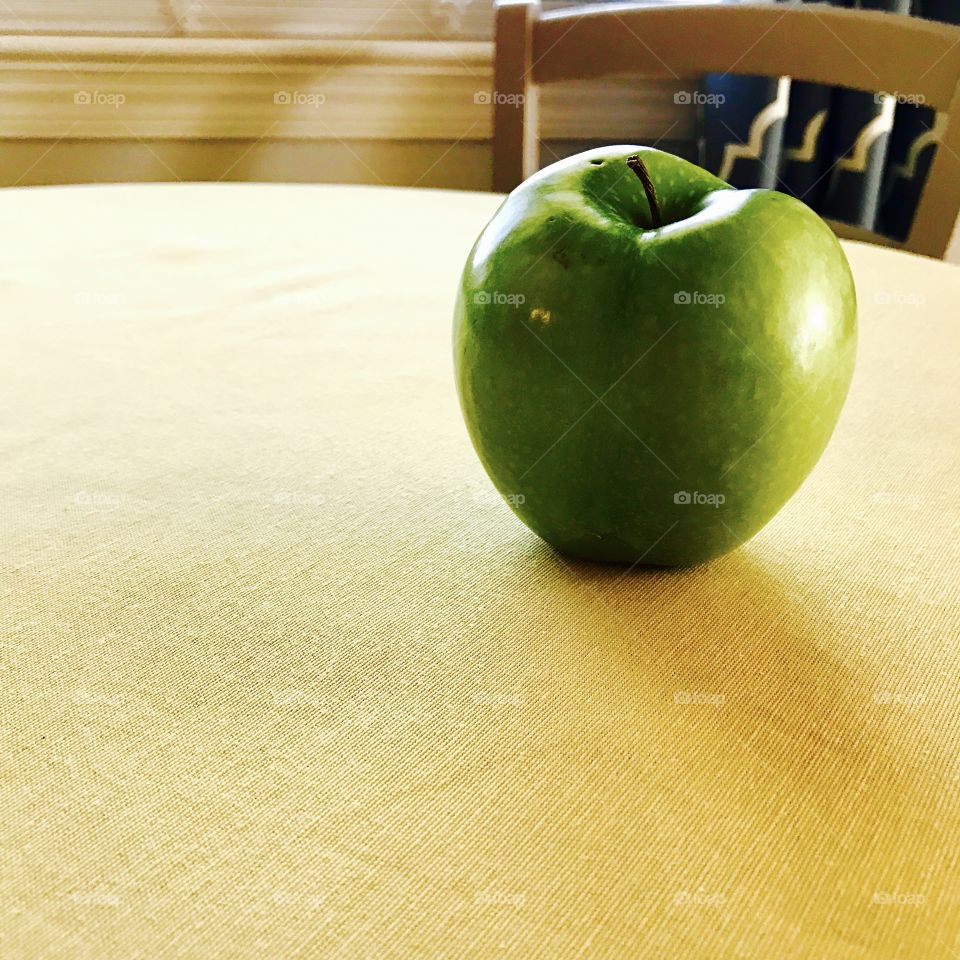 Green Apple on Table