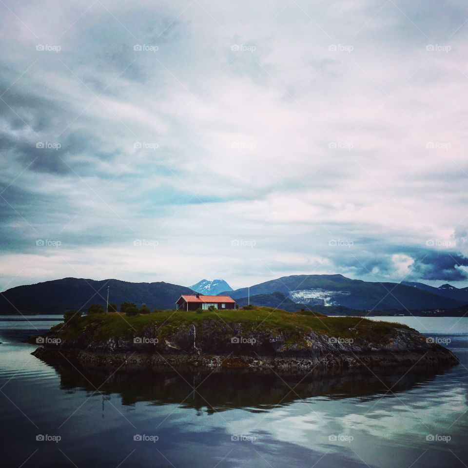 Little house standing on the island 