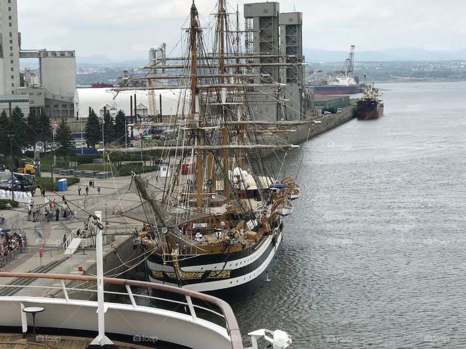 An Antique Ship At Port In Quebec