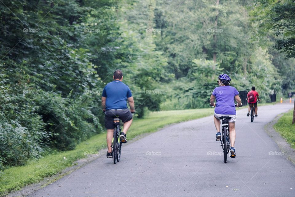 Adults on bikes 