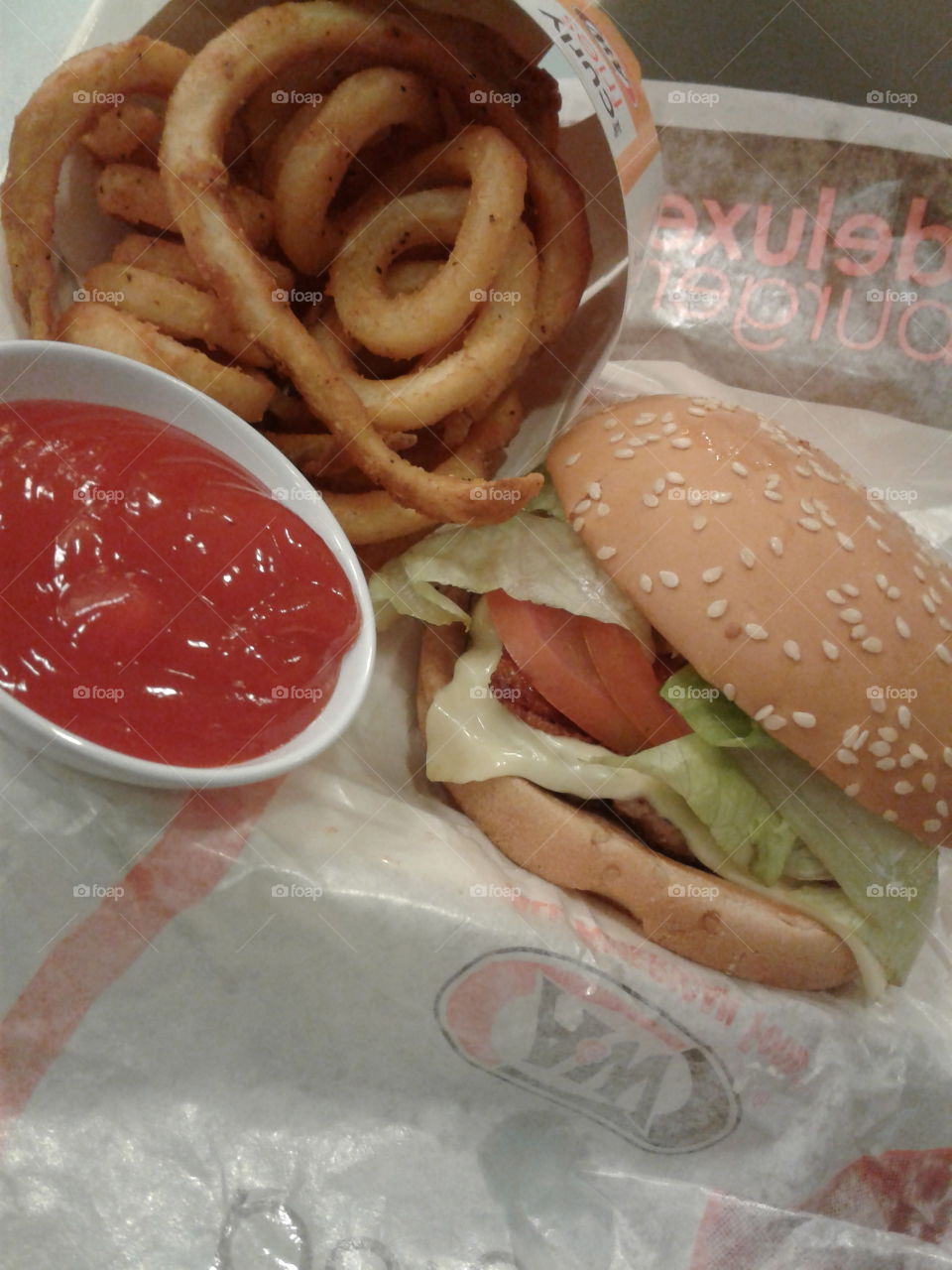 Burger, Curly Fries, and Chilli Sauce ...👌
