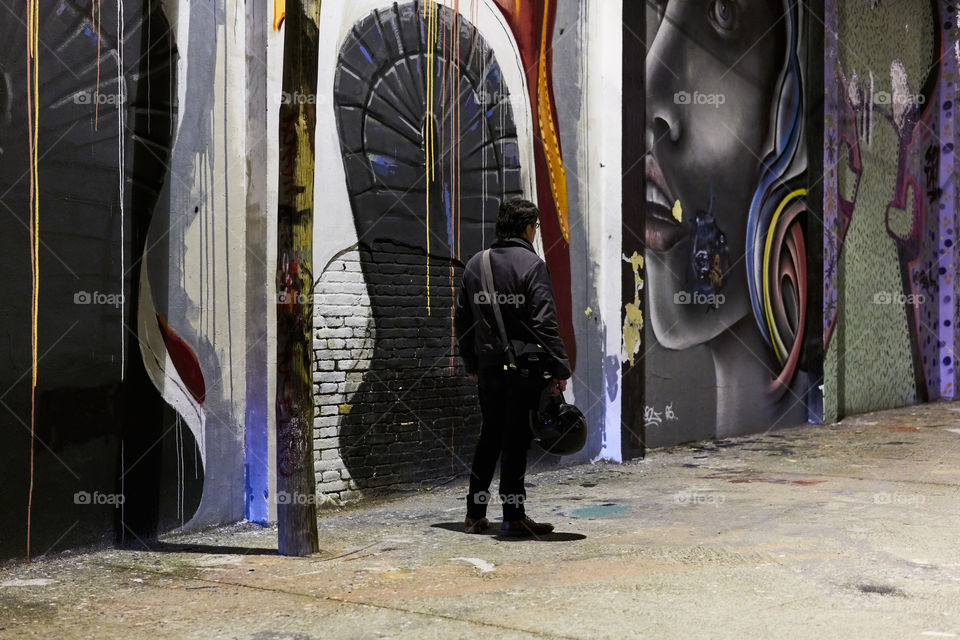 Night lights over a Graffiti Wall