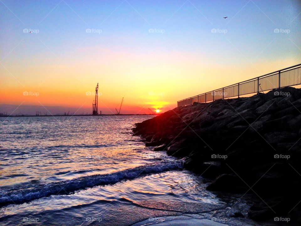 Sunset Pier. The Persian Gulf as seen from Jumeirah, Dubai. 