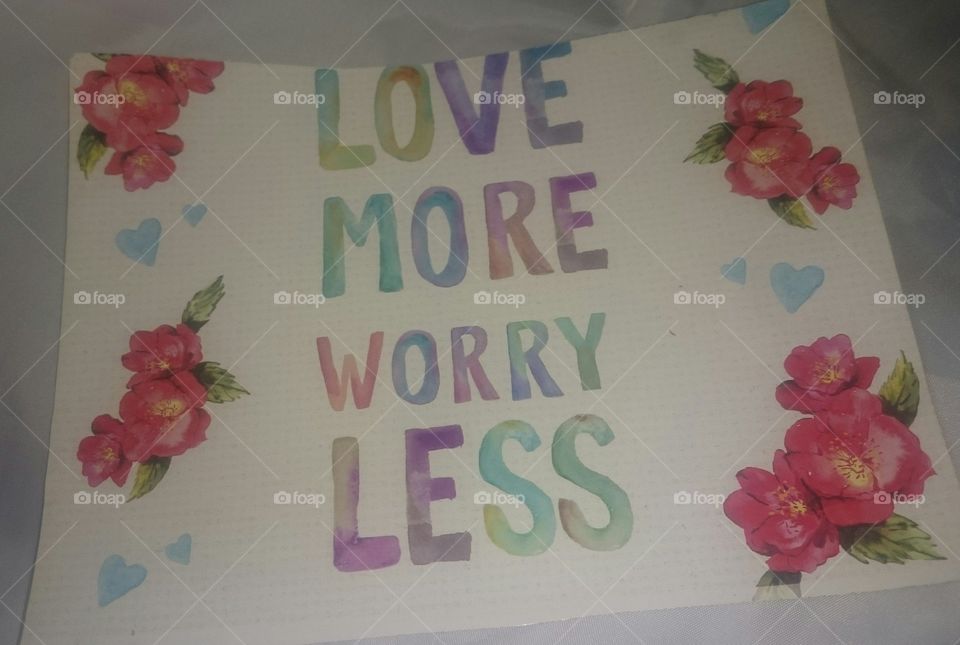 love more worry less quote on paper