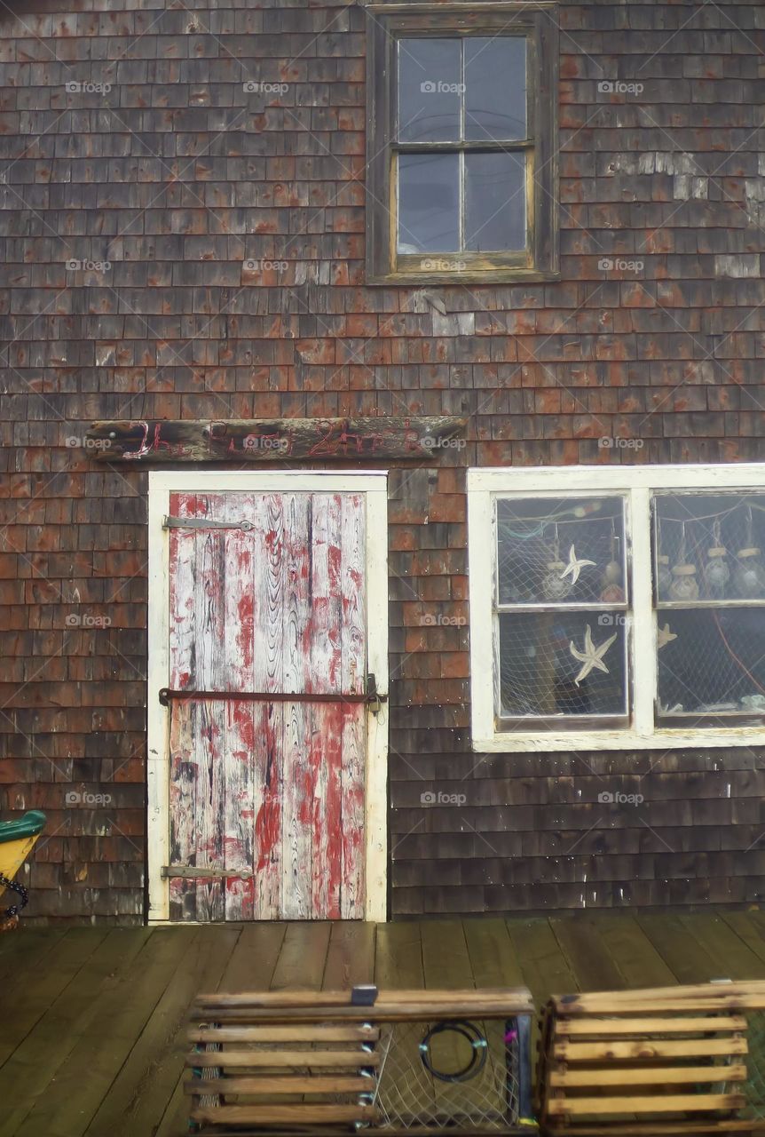 Postcard setting on a foggy day in Peggy’s Cove.